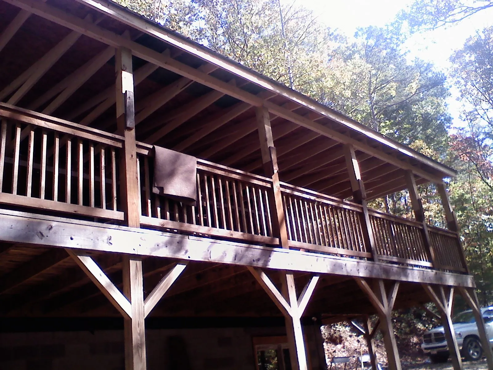 Timber framing under a new elevated porch and deck — Roof Leak Repair in Smiths Station by Roofing Brothers